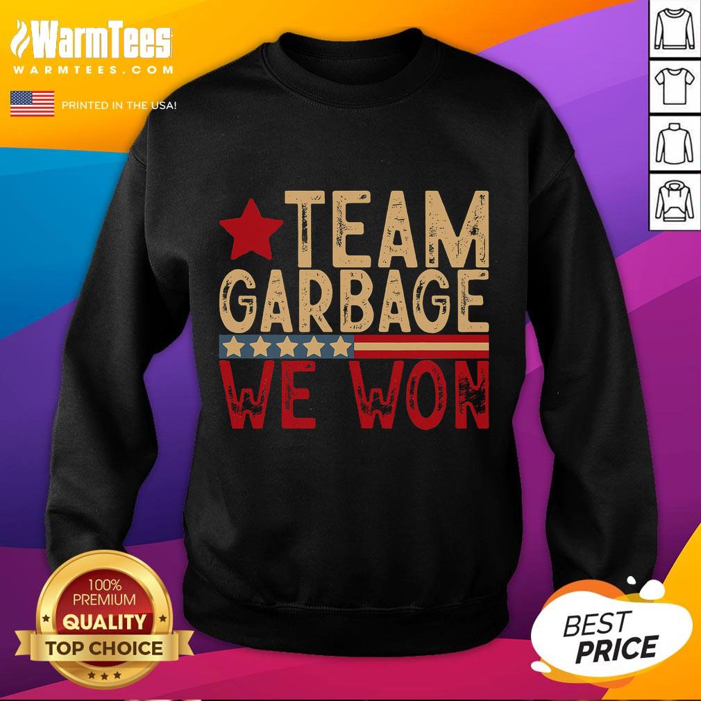 Awesome Team wearing 'Team Garbage For Trump 2024 Elections' sweatshirts, showcasing support for the campaign.