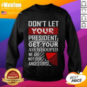 Vintage sweatshirt featuring humorous text: 'Don't Let Your President Get Your Ass Whooped' in bold typography.
