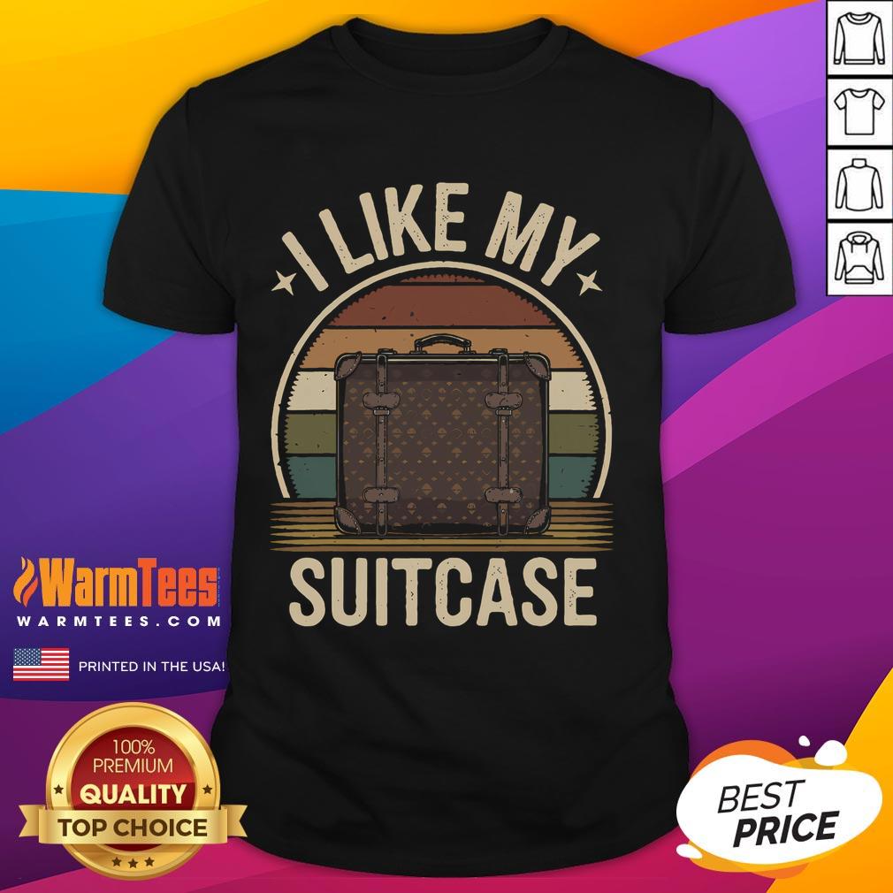Funny vintage 'I Like My Suitcase' Trump meme T-shirt featuring a quirky design for humor and travel enthusiasts.