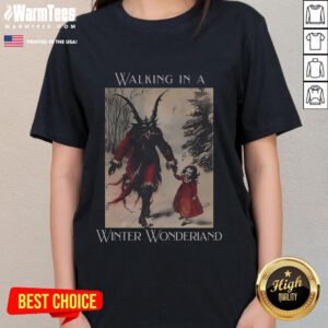 Good Krampus walking in a winter wonderland on a Christmas ladies tee, perfect for festive holiday celebrations.
