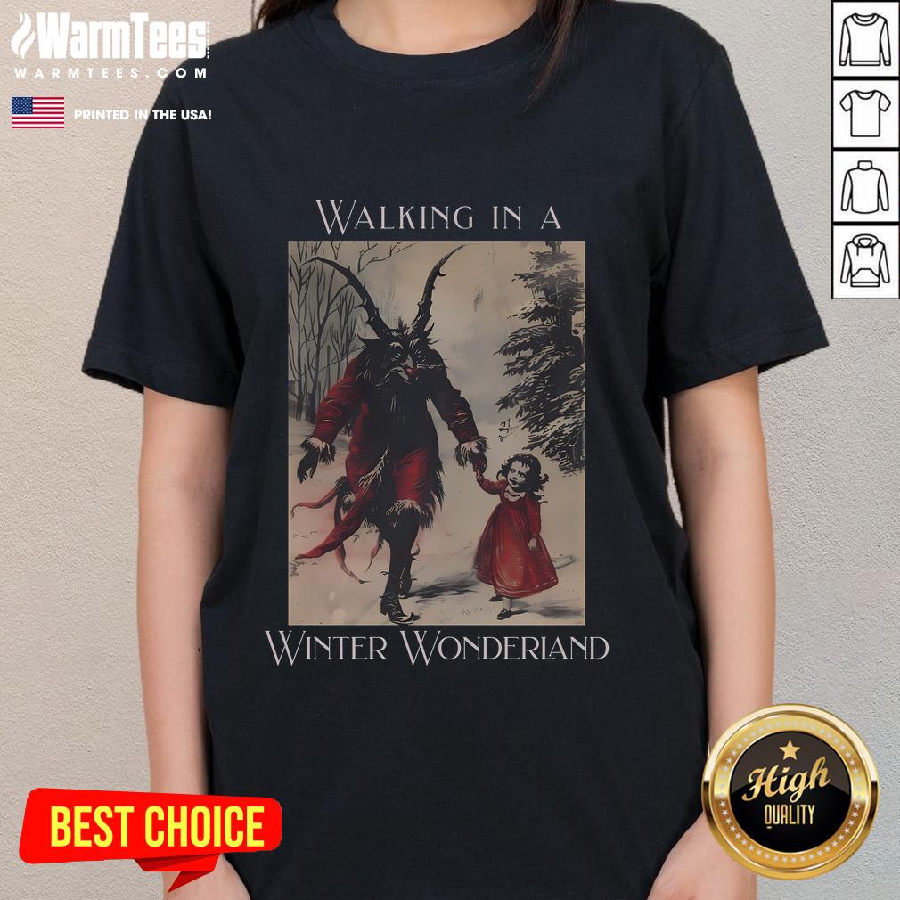 Good Krampus walking in a winter wonderland on a Christmas ladies tee, perfect for festive holiday celebrations.