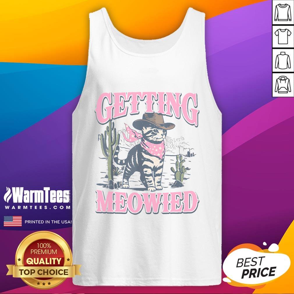 Cat bride wearing 'Good Meowdy' tank top at bachelorette party, celebrating with a fun cowgirl theme.