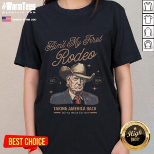 Awesome Ain't My First Rodeo Trump Cowboy Taking America Back Ladies Tee featuring a patriotic cowboy design.