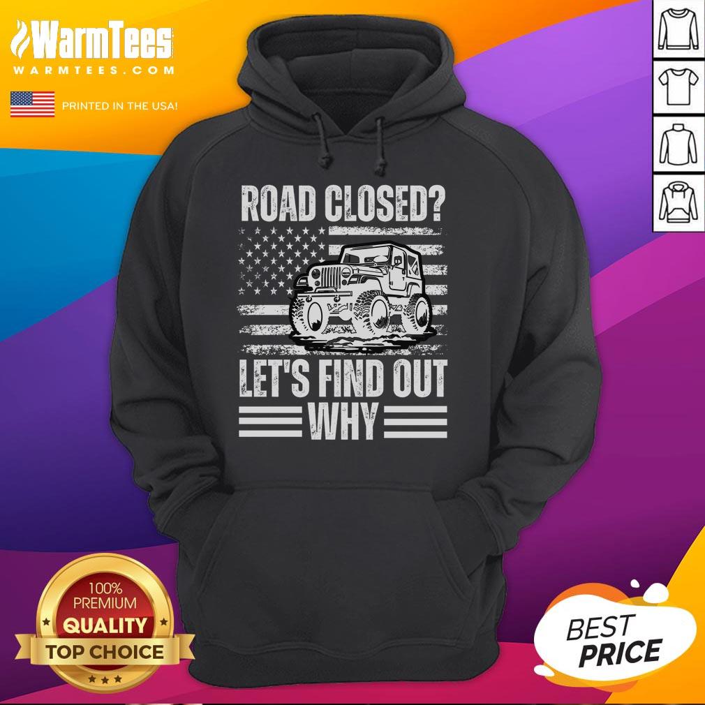 Vintage USA flag hoodie on display with road closed sign, capturing a unique blend of style and adventure.