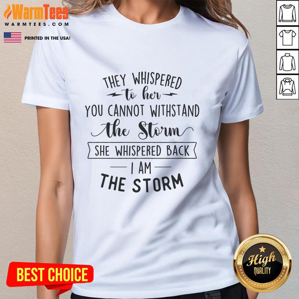Motivational quote tee for women: 'She whispered I am the storm' on a stylish ladies t-shirt.