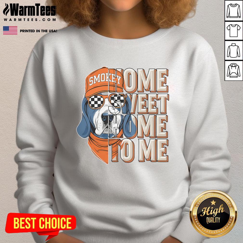 Cozy Awesome Smokey Dog Home Sweet Home To Me sweatshirt displayed on a wooden table with a dog motif.