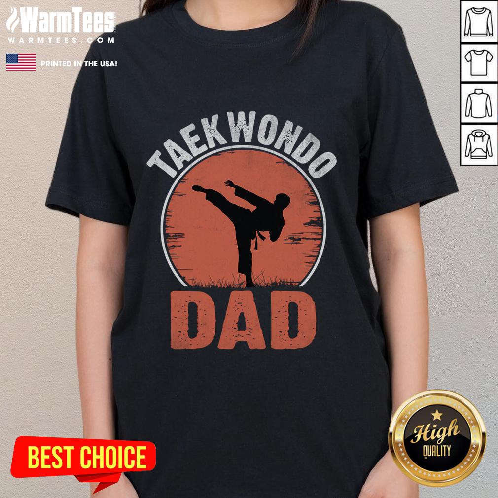 Awesome Taekwondo dad wearing a martial arts tee, showcasing pride in TKD and family dedication to martial arts.