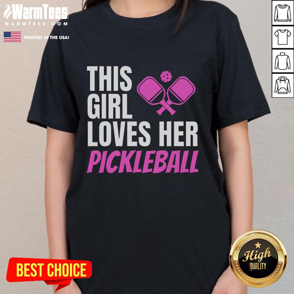 Girl wearing 'Awesome This Girl Loves Her Pickleball' ladies tee, smiling on a pickleball court.