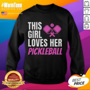 Alt Text: Girl wearing an awesome pickleball sweatshirt, showcasing her love for the sport with a big smile on the court.