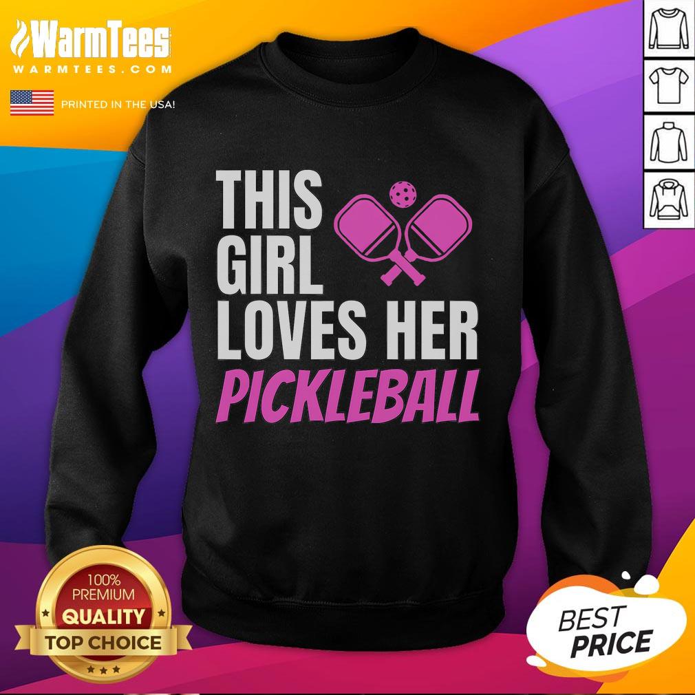 Alt Text: Girl wearing an awesome pickleball sweatshirt, showcasing her love for the sport with a big smile on the court.