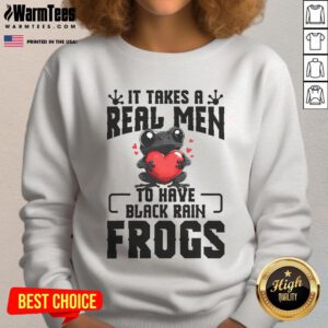 Cute black rain frog in a terrarium with a dad wearing a rain frog sweatshirt, showcasing a cozy amphibian habitat.