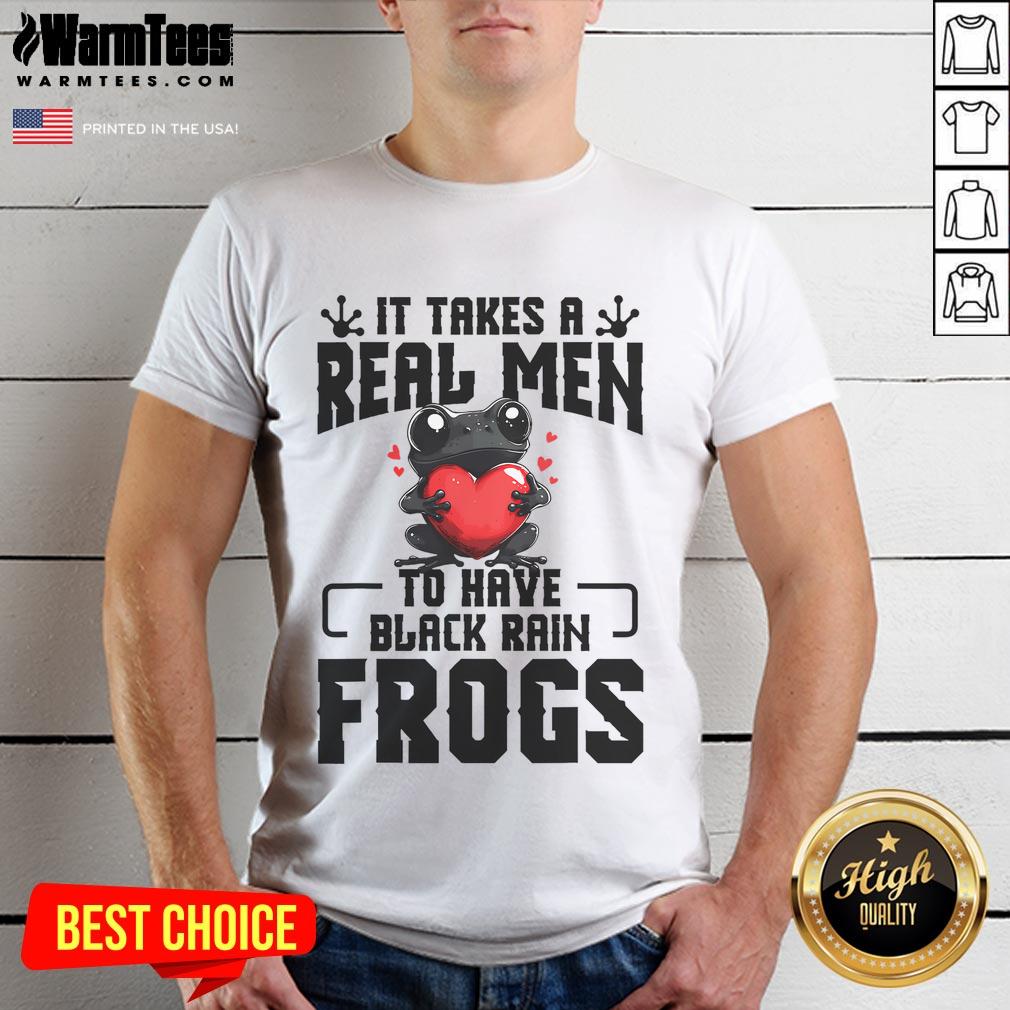 Adorable black rain frog in a terrarium, featured on a 'Dad Rain Frog' T-shirt for frog lovers and enthusiasts.