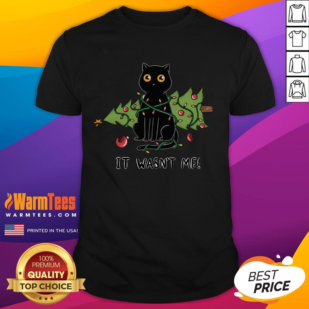 Cute cat and Christmas tree t-shirt design featuring a playful kitty beside a decorated tree for festive spirit.