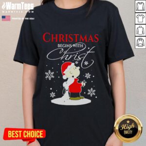 Ladies tee featuring Snoopy in a cute Christmas design, perfect for holiday celebrations and Peanuts fans.