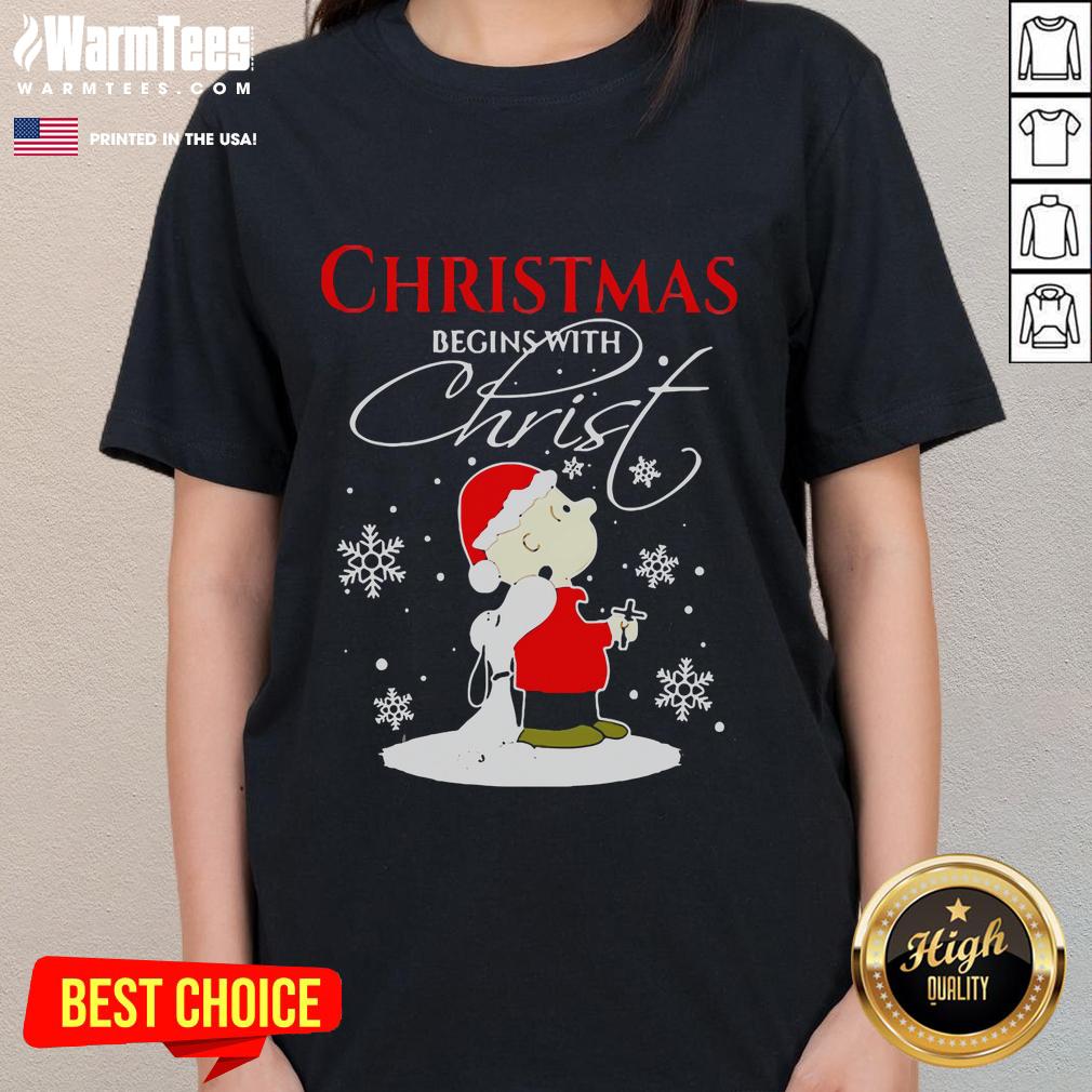 Ladies tee featuring Snoopy in a cute Christmas design, perfect for holiday celebrations and Peanuts fans.