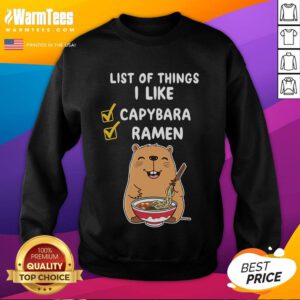 Alt Text: Cute kawaii capybara design on a sweatshirt featuring a list of things I like, including ramen, perfect for anime fans.