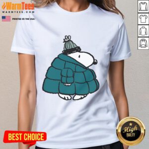 Alt Text: Cute Peanuts Snoopy winter puffer jacket poster on a stylish ladies tee, perfect for winter fashion lovers.