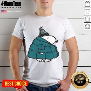Alt Text: Cute Peanuts Snoopy winter puffer jacket poster design on a stylish t-shirt for fans of classic cartoons.