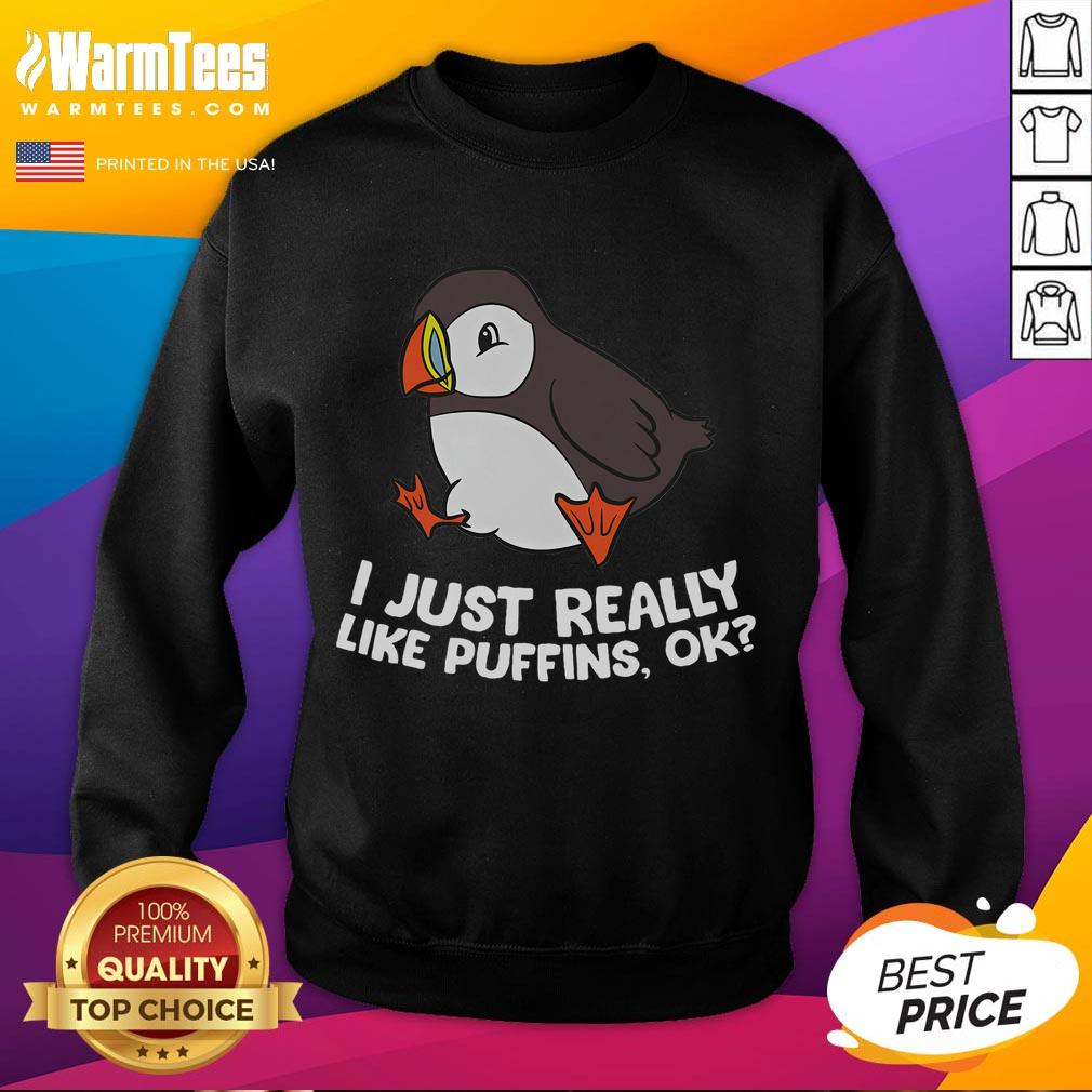Cute Puffin Lover sweatshirt featuring a whimsical puffin design, perfect for puffin enthusiasts and cozy fashion.