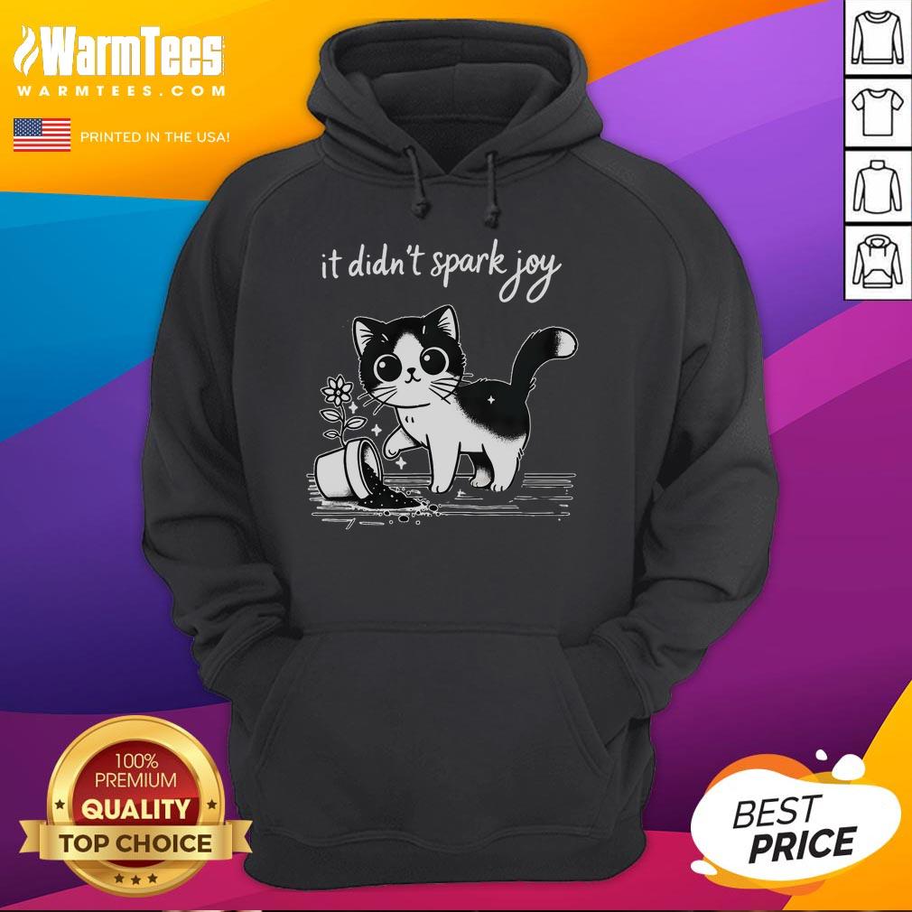 Adorable tuxedo cat meme on a hoodie with a funny quote about sparking joy, perfect for cat lovers.