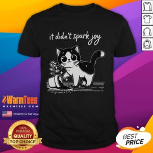 Alt Text: Cute tuxedo cat funny meme on a T-shirt with a quote about sparking joy, perfect for cat lovers.