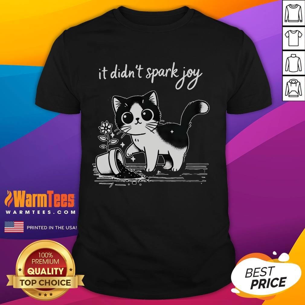 Alt Text: Cute tuxedo cat funny meme on a T-shirt with a quote about sparking joy, perfect for cat lovers.