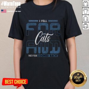 Funny cat quote on a ladies tee: 'Fell for cats and never looked back' with a playful cat graphic.