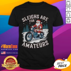 Alt Text: Humorous Christmas Santa Claus riding a motorcycle on a festive T-shirt design for the holiday season.