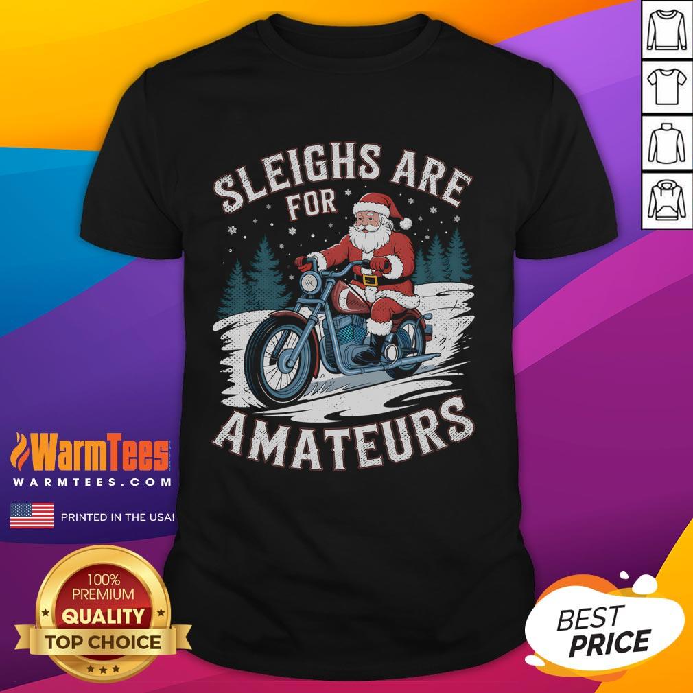 Alt Text: Humorous Christmas Santa Claus riding a motorcycle on a festive T-shirt design for the holiday season.
