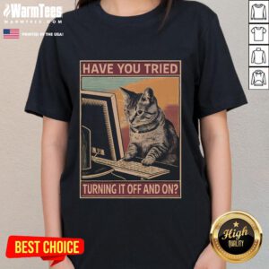 Funny cat ladies tee featuring tech support humor: 'Have you tried turning it off and on?' Perfect for tech enthusiasts!