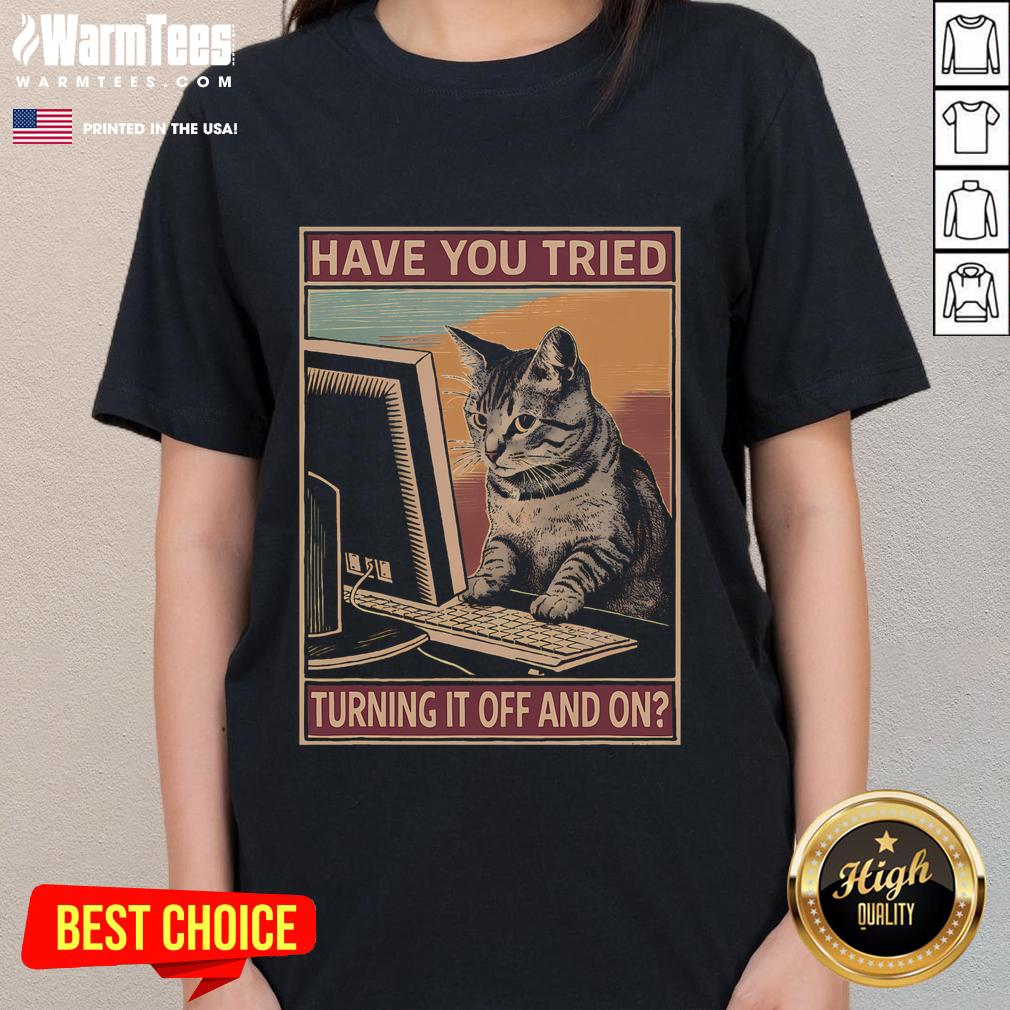 Funny cat ladies tee featuring tech support humor: 'Have you tried turning it off and on?' Perfect for tech enthusiasts!