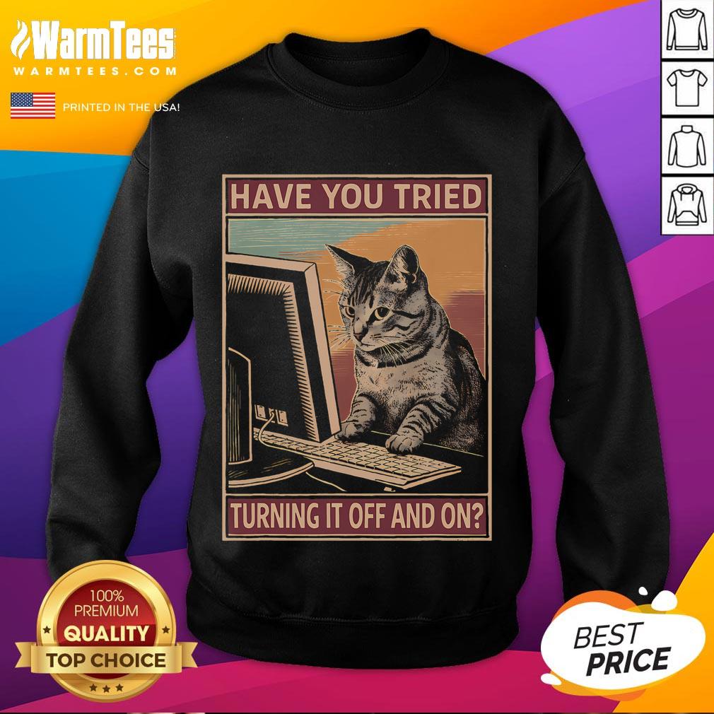 Funny cat sweatshirt featuring tech support humor: 'Have you tried turning it off and on?' Perfect for tech lovers.