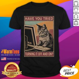 Funny cat t-shirt featuring tech support humor: 'Have You Tried Turning It Off And On?' perfect for tech lovers.