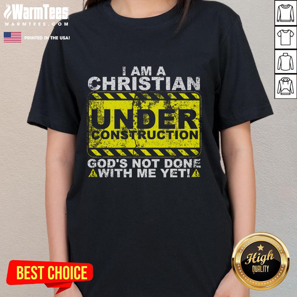 Funny 'I Am A Christian Under Construction' graphic on a ladies tee featuring playful dogs, perfect for casual wear.