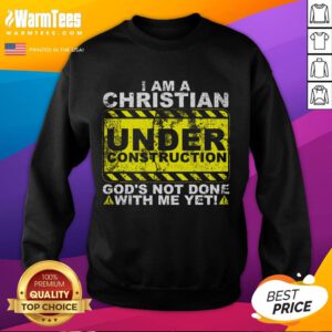 Funny 'I Am A Christian Under Construction' sweatshirt featuring playful dogs, perfect for casual Christian wear.
