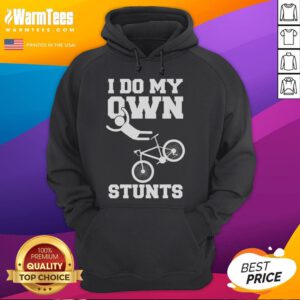 Funny 'I Do My Own Stunts' hoodie wearer with a broken arm in a hospital, showcasing recovery and humor in biking accidents.