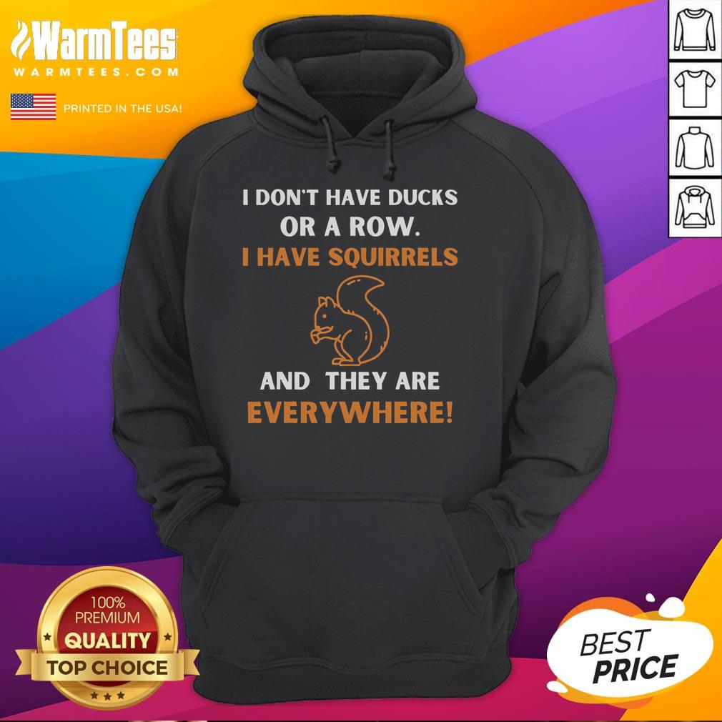 Funny hoodie with the phrase 'I don't have ducks in a row, I have squirrels everywhere' in playful font on a cozy design.