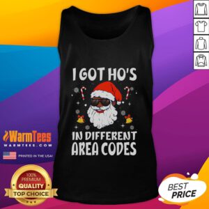 Afro-American Santa Claus wearing a tank top with 'I Got Hos In Different Area Codes' text, showcasing holiday humor.
