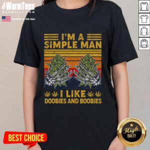 Funny vintage ladies tee featuring the phrase 'I'm a simple man, I like doobies and boobies' in playful typography.