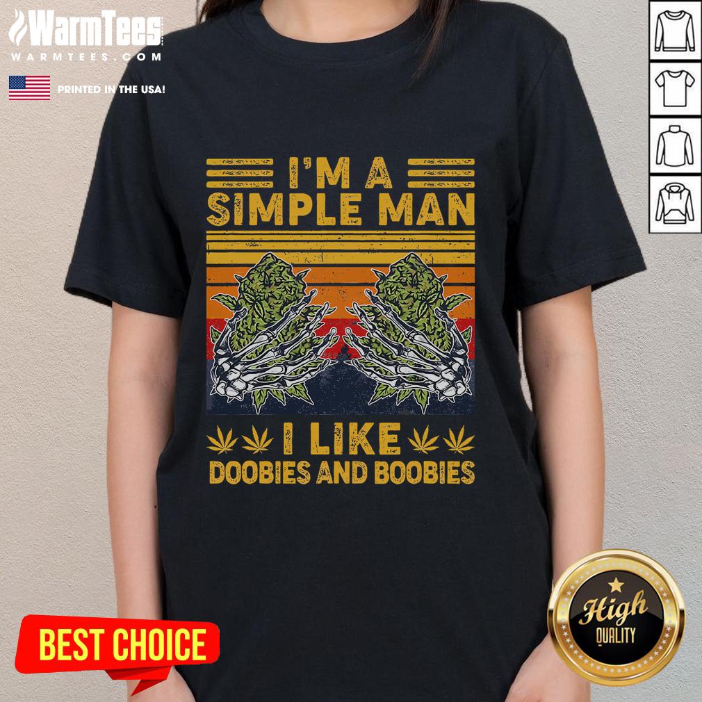 Funny vintage ladies tee featuring the phrase 'I'm a simple man, I like doobies and boobies' in playful typography.