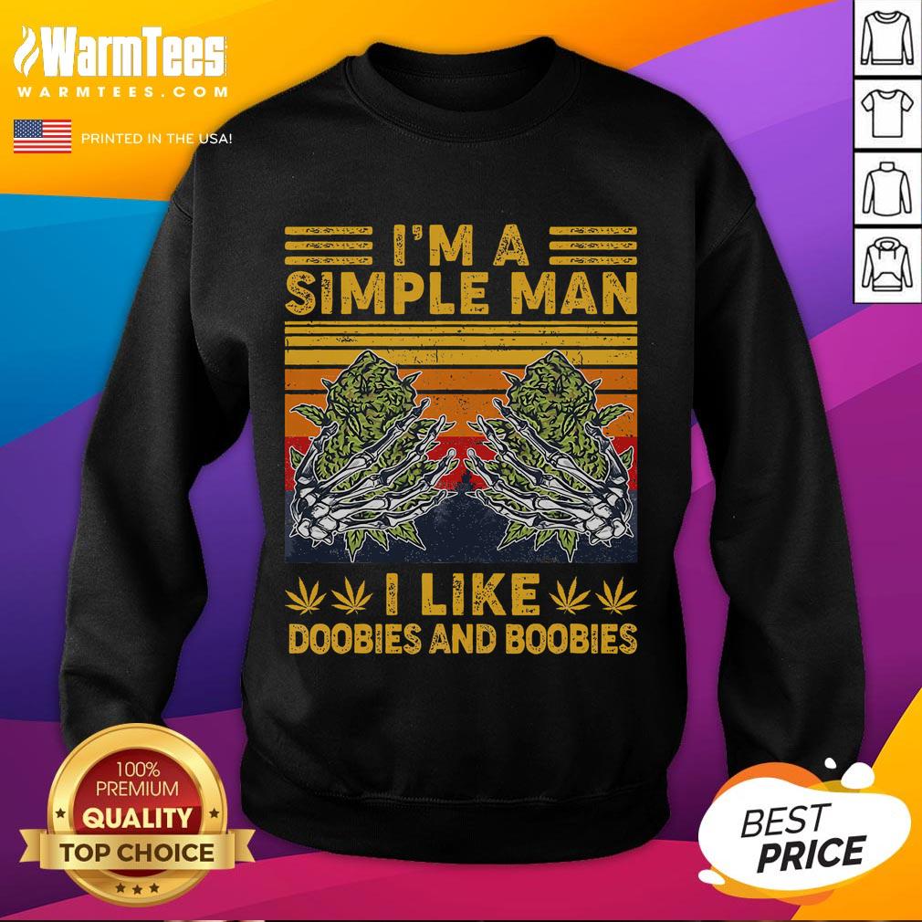 Alt Text: Vintage sweatshirt featuring the phrase I'm a simple man, I like doobies and boobies in a fun design.