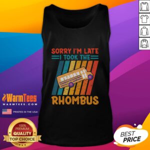 Funny math teacher wearing a vintage tank top with 'Sorry I'm Late, I Took The Rhombus' humor design.