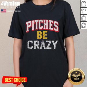 Funny softball player in action pitching wildly, showcasing a playful spirit in a vibrant 'Be Crazy' ladies tee.