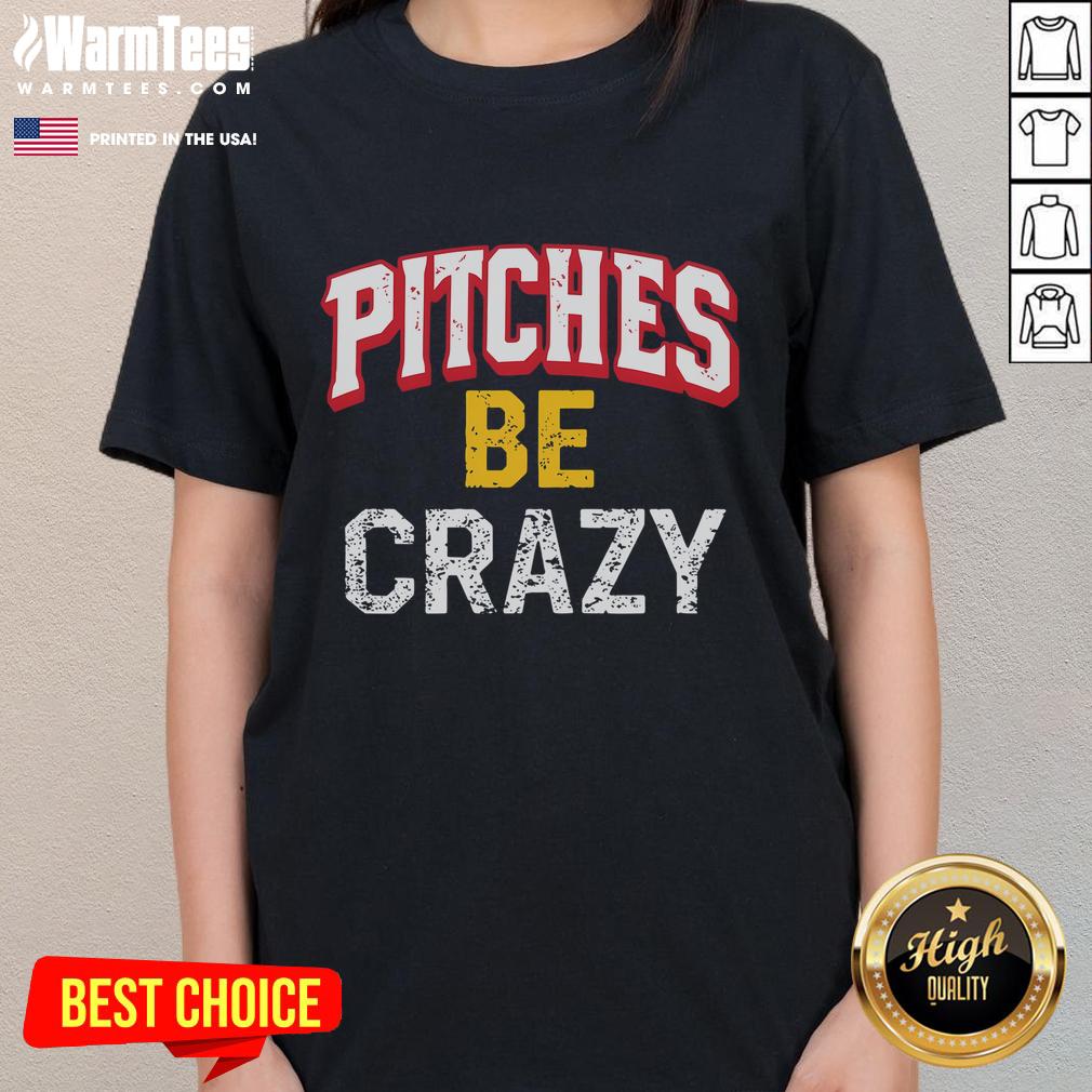 Funny softball player in action pitching wildly, showcasing a playful spirit in a vibrant 'Be Crazy' ladies tee.