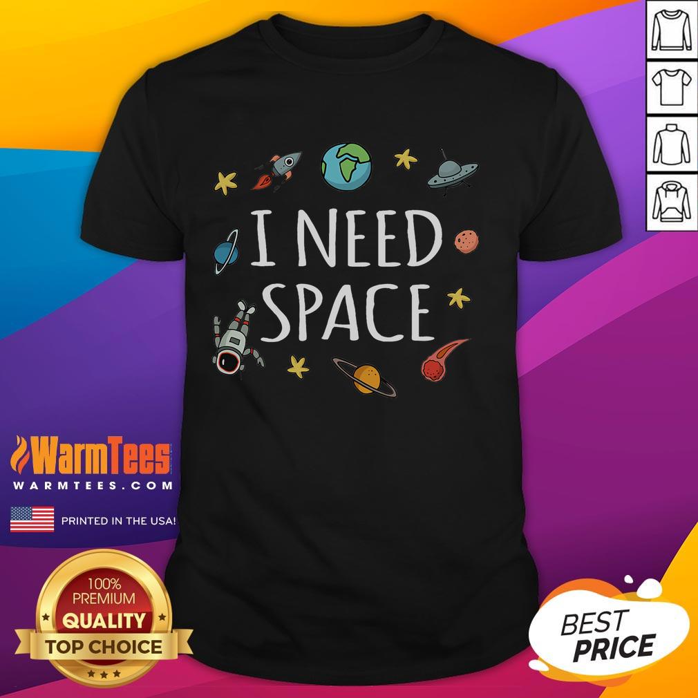 Funny 'I Need Space' astronaut t-shirt showcasing a playful space theme with a cartoon astronaut in a colorful design.