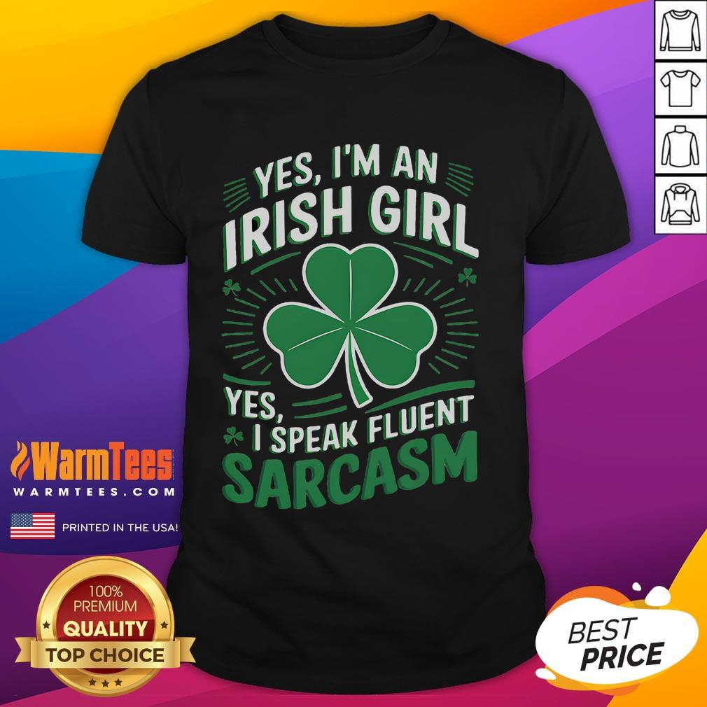 Funny Irish girl wearing a T-shirt that says 'Fluent in Sarcasm', showcasing humor and Irish culture.