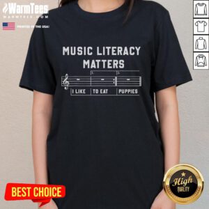 Funny 'Like to Eat Puppies' music literacy tee for ladies, showcasing a playful design and vibrant colors.