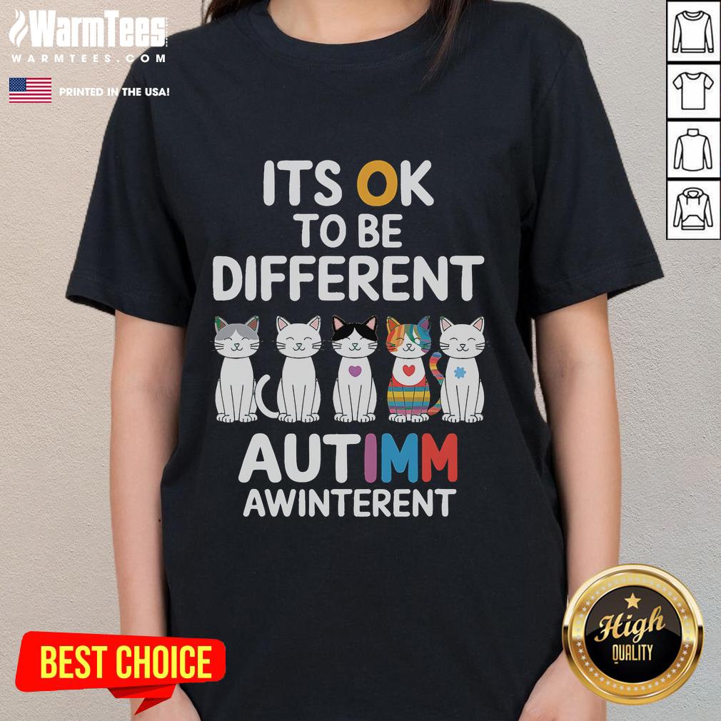 Alt Text: Cute autism awareness cat graphic on a ladies tee, promoting the message 'It's OK to be different'.
