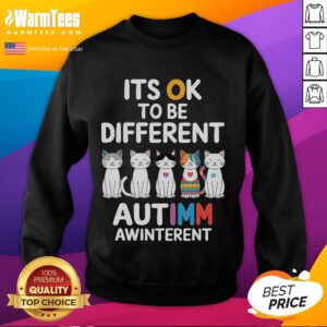 Cute autism awareness cat sweatshirt with 'It's OK to be different' message, promoting acceptance and individuality.