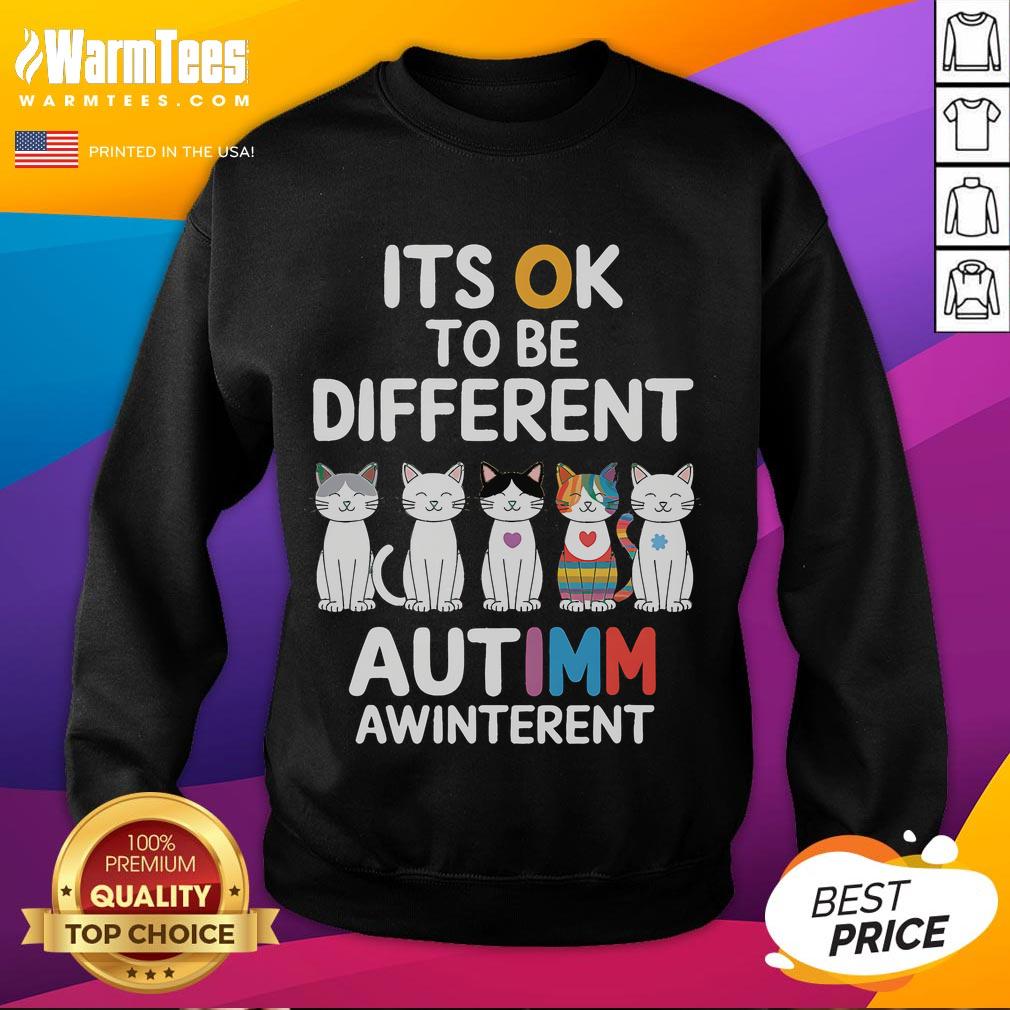 Cute autism awareness cat sweatshirt with 'It's OK to be different' message, promoting acceptance and individuality.